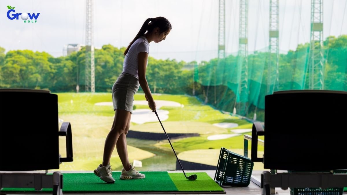 Player practising at the driving range